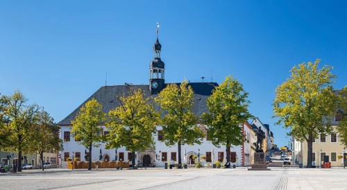 Market place with Duke Heinrich monument and town hall in Marienberg