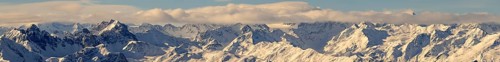 Panorama of the snow-covered Alpine range in winter