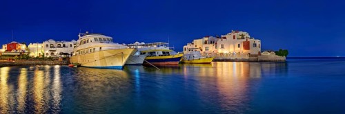 Boat harbour with dive boat at sunset