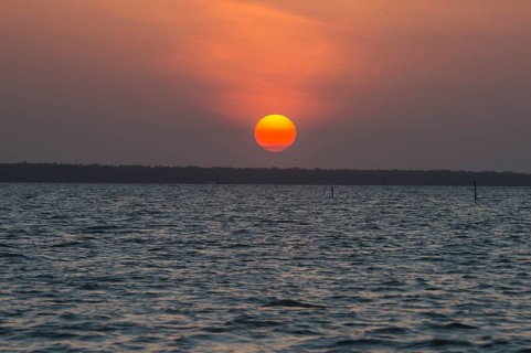 Sunset over the Suriname river near Paramaribo