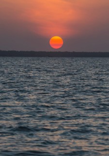 Sunset over the Suriname river near Paramaribo