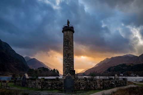 Loch Shiel with Glenfinnan Monument under threatening cloudy sky
