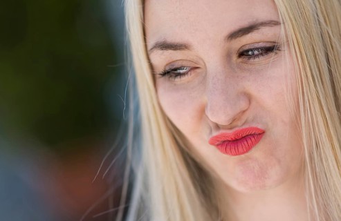 18 year old young woman pouting