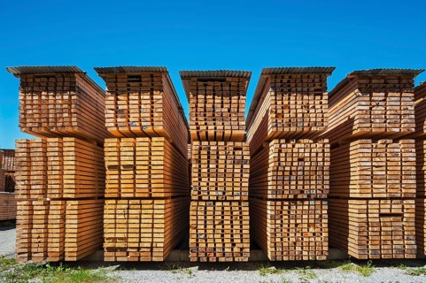 Stacked wooden slats and boards in a sawmill