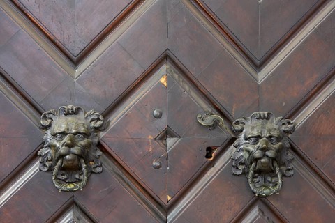 Lion heads as door knockers