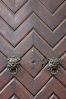 Lion heads as door knockers