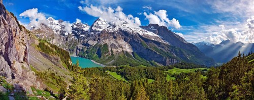 Oeschinen Lake with Bernese Alps with Bluemlisalp and mountain Doldenhorn