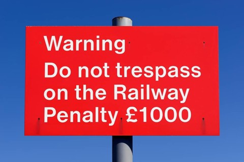 Do not trespass on the railway sign