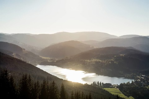 View from Hochfirst to Lake Titisee and Feldberg mountain at sunset