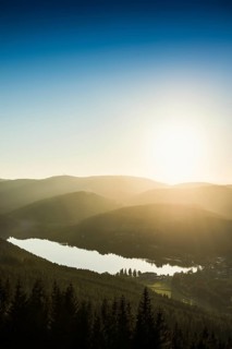 View from Hochfirst to Lake Titisee and Feldberg mountain at sunset