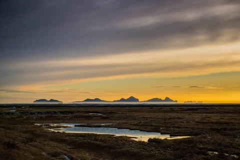 View from the mainland to the Westman Islands at sunset