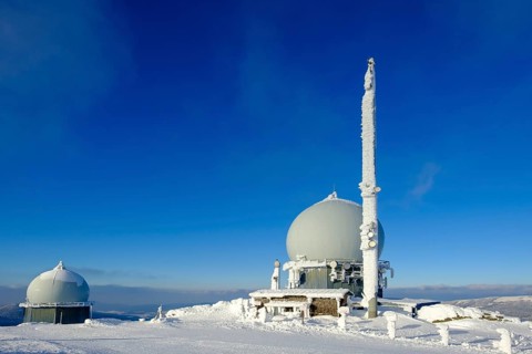 Radome and antenna at the summit in winter