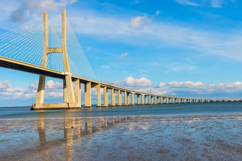Ponte Vasco da Gama reflecting in the Tagus river