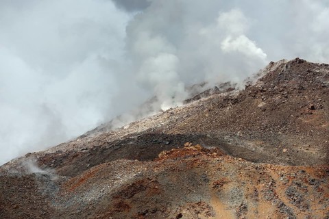 Smoking fumaroles at the summit of the volcano Chaiten