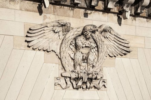 Heraldic animal eagle with a laurel wreath