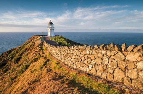 Away with stone wall leads to the lighthouse at Cape Reinga