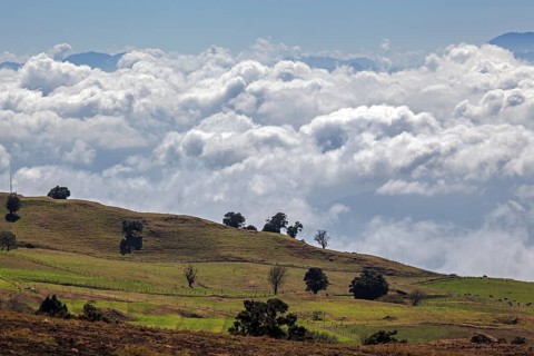 View from the southern slope of Irazu Volcano to the cultural landscape and cloud cover