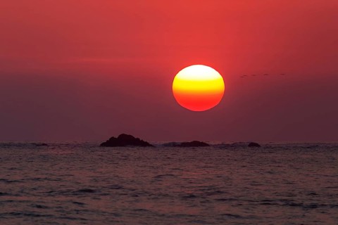 Red glowing sunset over the sea