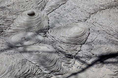 Fumarole with bubbling grey mud