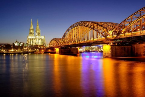 Cologne Cathedral with Hohenzollern Bridge over the Rhine