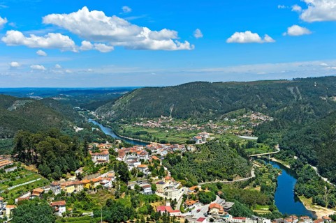 View from the viewpoint Penedo de Castro to the city Penacova at the river Mondego