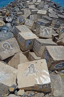 Pictures of famous musicians painted on stones