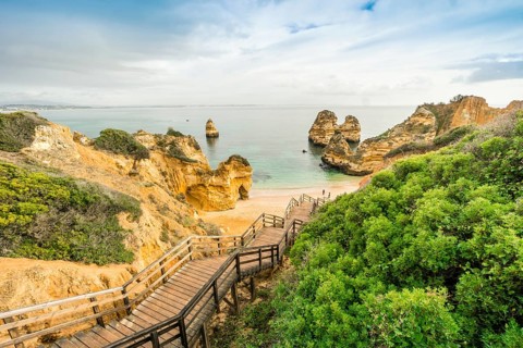 Camilo Beach with wooden walkway to the sandy beach