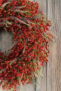 Autumn wreath on wooden wall cutout