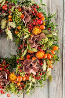 Autumn wreath cutout on wooden wall