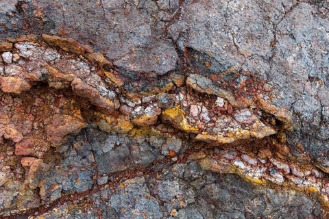 Various colorful rock layers in the rock