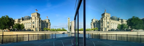 Reichstag reflected in glass facade of Marie-Elisabeth-Luders-Haus