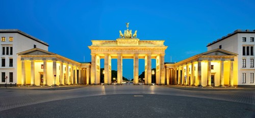 Pariser Platz with illuminated Brandenburg Gate at dawn