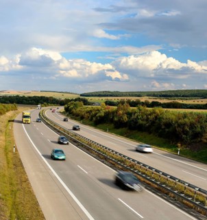 Truck and car in motion blur