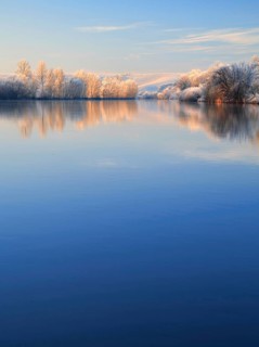 River landscape in winter at the river Saale