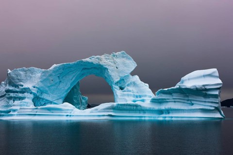 Ice bow in Scoresbysund at dawn