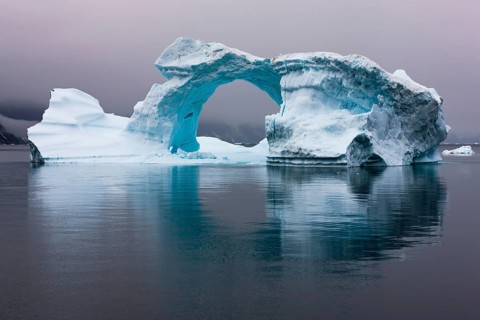 Ice bow in Scoresbysund at dawn