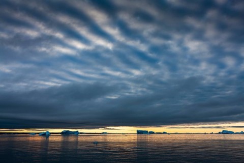 Icebergs at sunrise in the Arctic Sea