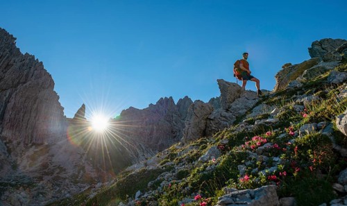 Hiker stands on a rock