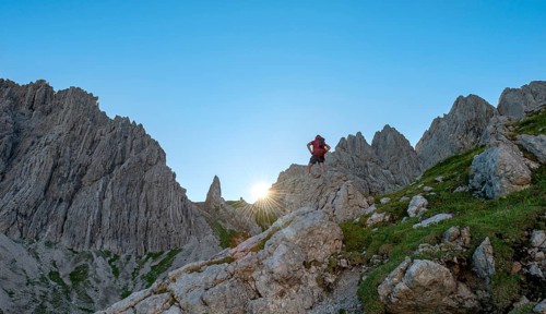 Hiker stands on a rock
