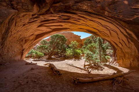 View through rock arch Navajo Arch