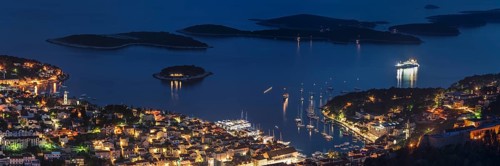Town view Hvar with harbour and Pakleni islands at night