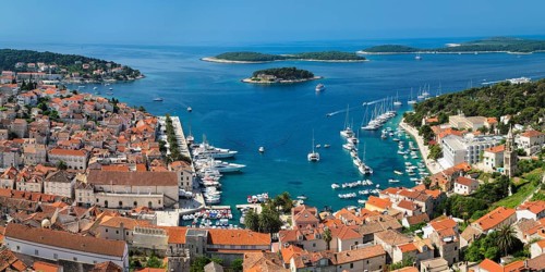 Overview of Old Town with harbour and Pakleni Islands