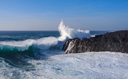 Surf at rocky coast