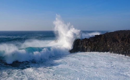 Surf at rocky coast
