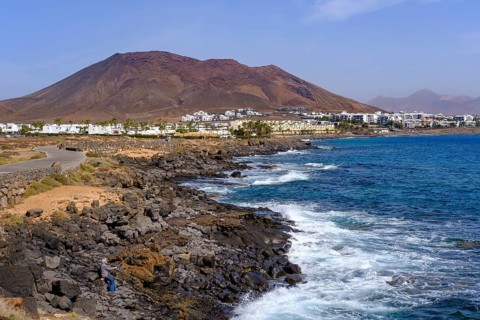 Rugged coast with volcano Montana Roja