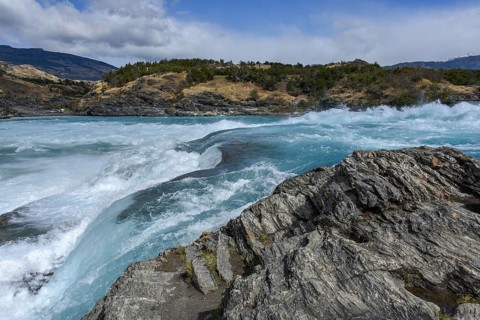 Rapids at the confluence of the turquoise Rio Baker and the glacier grey Rio Nef