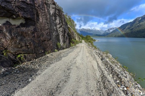 Gravel road with rainbow near Puerto Rio Tranquilo