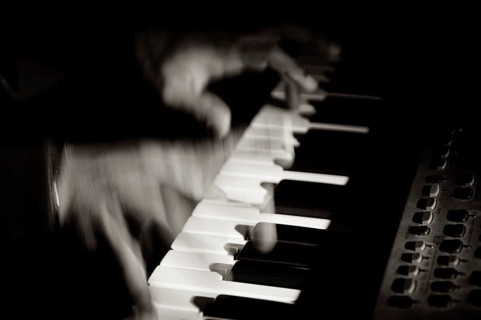 Pianist playing keyboard
