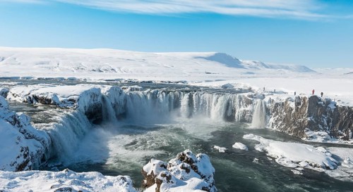 Gooafoss Waterfall in winter with snow and ice