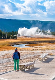 Tourist observes eruption of Castle Geysir